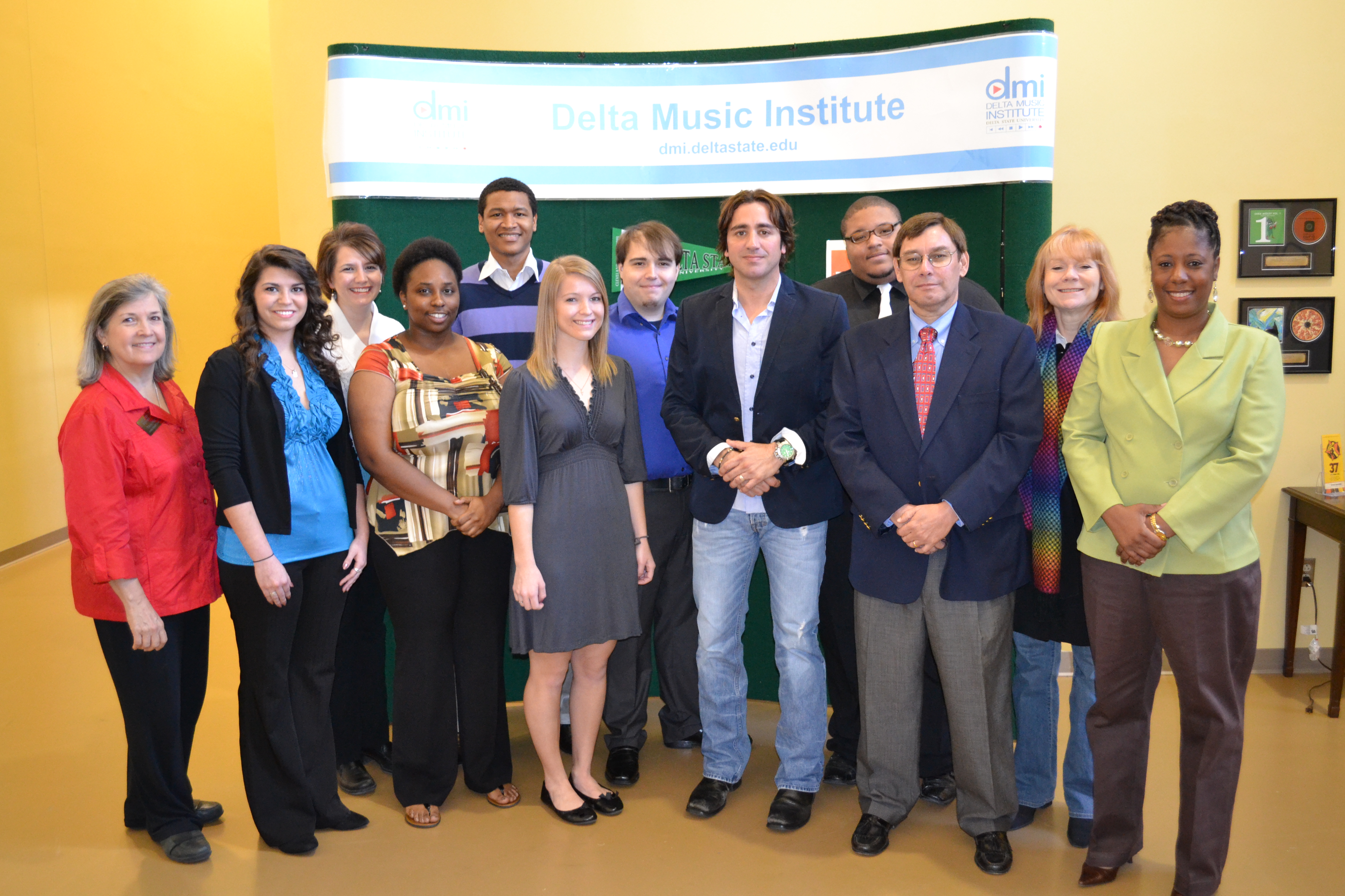 PHOTO:  Front row, from left, DMI Director Tricia Walker, Lindsey Zweber of Olive Branch, Laeitta Wade of Greenville, Alyssa Shetley of Salem, Illinois, Delta Music Institute artist-in-residence Steve Azar, Dr. Cooper Johnson, Chair, Entrepreneurship in Business Technology,  and Dr. Tomeka Harbin, Assistant Professor of Management. Back row, from left, Dr. Jayme Long, Assistant Professor of Management, Hyacine DoRego of Libreville, Gabon; Matthew Coleman of Jackson, Jeremy Carodine of Cleveland,  and Renee Foster, Instructor in Marketing.